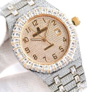 Iced-Out Luxury Timepiece with Baguette-Cut Stones
Indulge in pure luxury.